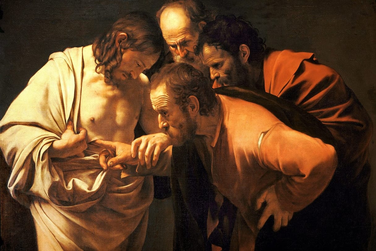 The apostle Thomas, frowning in concentration, pushes his finger into the wound in the risen Jesus's side while two other apostles lean in to look.