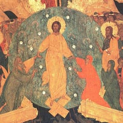 Christ, robed in gold within a blue-green circle of light, stands on the broken gates of hell and takes Adam and Eve by the wrists, while kings, prophets, and saints crowd in on either side.