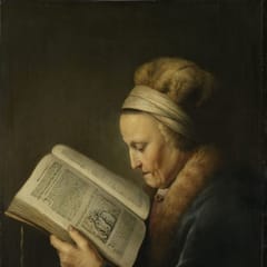 An elderly woman in a fur-trimmed hood bends close over a large open Bible, reading carefully.