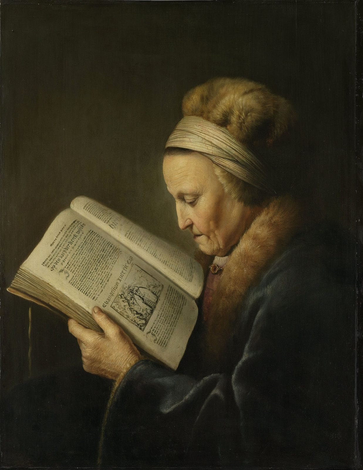 An elderly woman in a fur-trimmed hood bends close over a large open Bible, reading carefully.