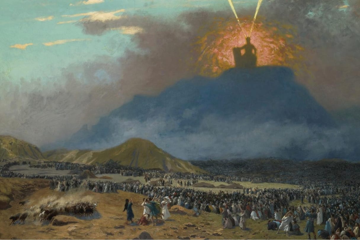 A vast crowd fills a desert plain below a dark mountain wrapped in cloud, while a small seated figure sits in a burst of fiery light at the summit.