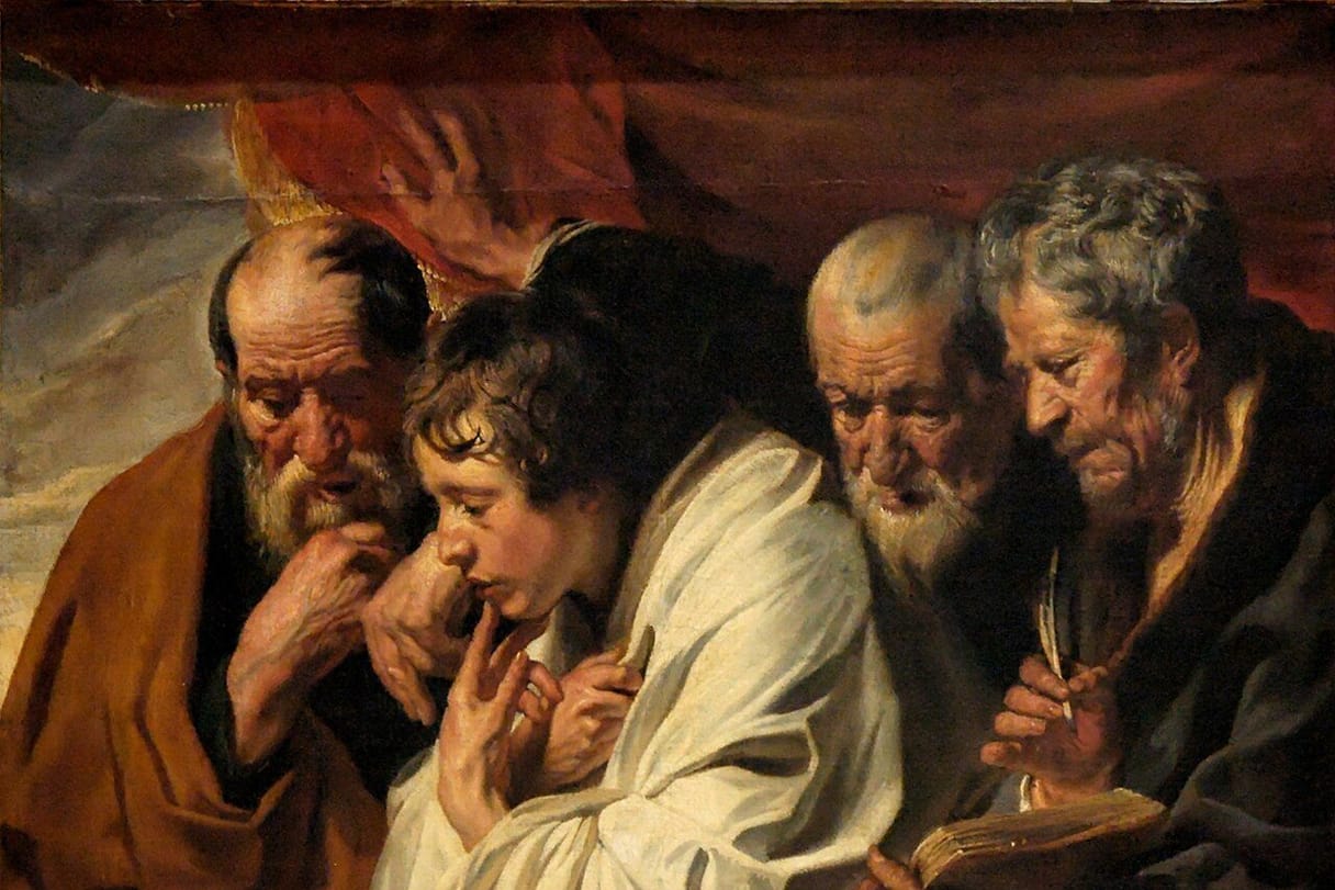 Four men, three old and one young, crowd together over open books, each absorbed in reading or writing.