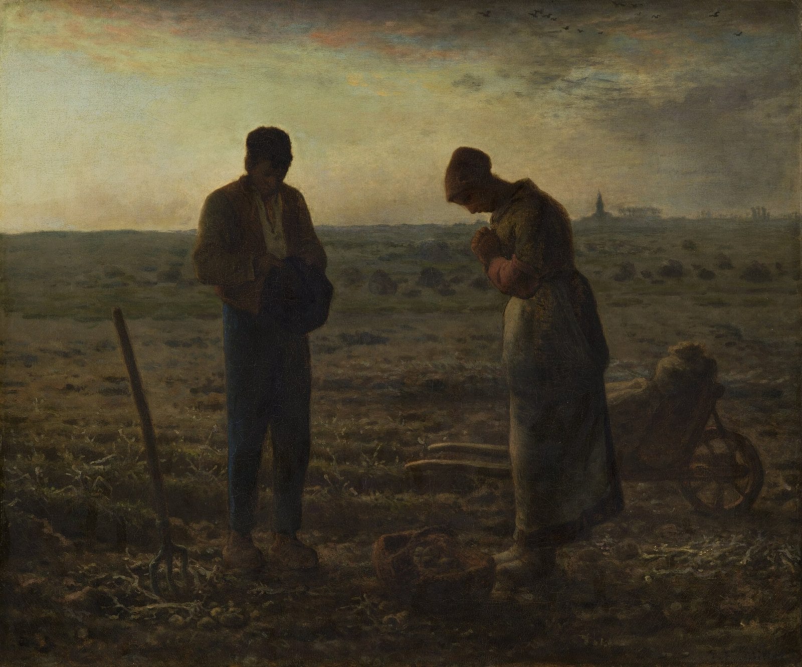 A farm couple stands with heads bowed in prayer in a darkening field, a basket of potatoes at their feet and a church spire on the horizon.