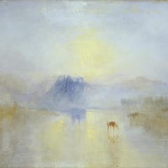 A soft yellow sun rises through mist over a still river, where the blue shape of a castle and a cow drinking at the water are barely visible.