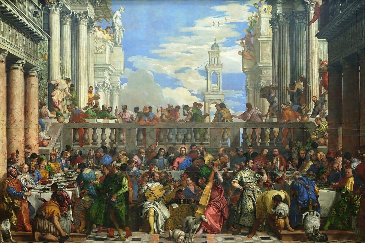A crowded wedding feast fills a marble courtyard under a bright sky, with Jesus seated at the center of the long table as servants pour wine and musicians play.
